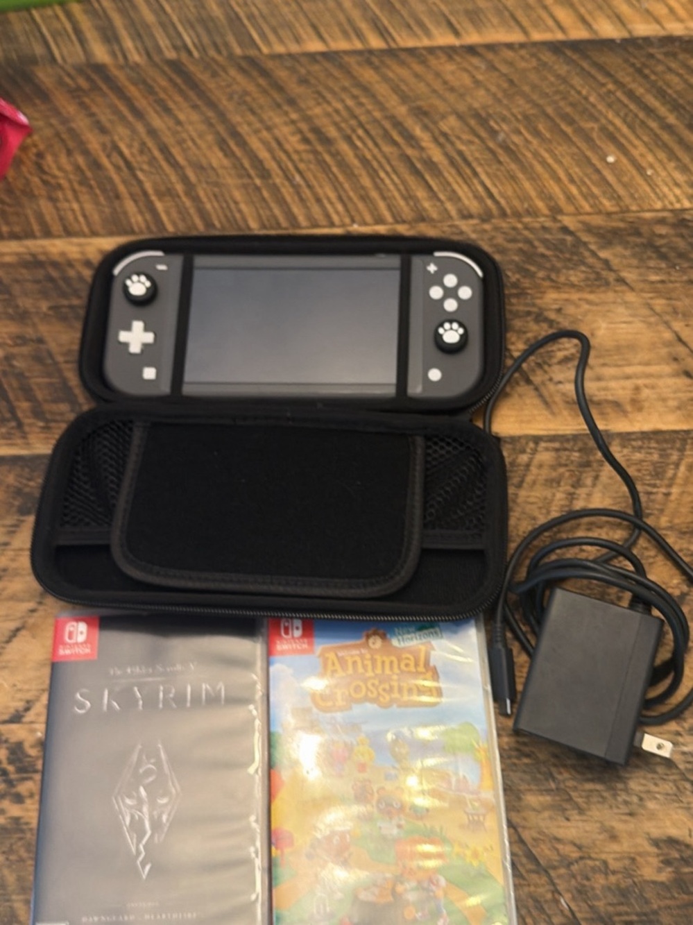 Nintendo Switch Lite Gray Handheld System  Case and Skyrim And Animal Crossing